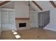 Vaulted living room featuring fireplace, built-ins, beams and staircase at 1670 Knob Creek Nw Ct, Acworth, GA 30101