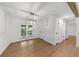 Dining room features a modern light fixture and french doors leading to the backyard at 1690 Eaglecreek Trl, Cumming, GA 30041