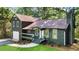 Charming home with a cozy front porch and well-manicured lawn at 1690 Eaglecreek Trl, Cumming, GA 30041