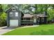 Charming home with a front porch and attached garage at 1690 Eaglecreek Trl, Cumming, GA 30041