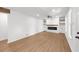 Comfortable living room with electric fireplace, built-in shelving and new hardwood floors at 1690 Eaglecreek Trl, Cumming, GA 30041