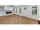 Comfortable living room with electric fireplace, built-in shelving and new hardwood floors at 1690 Eaglecreek Trl, Cumming, GA 30041