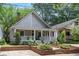 Charming single-Gathering home with a covered front porch and nicely landscaped front yard at 343 Josephine Ne St, Atlanta, GA 30307
