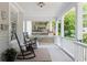 Charming front porch with rocking chairs, creating a welcoming and relaxing outdoor space at 343 Josephine Ne St, Atlanta, GA 30307