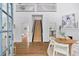 Bright, open-concept living space featuring high ceilings, staircase and hardwood floors at 343 Josephine Ne St, Atlanta, GA 30307