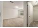 Bedroom with plush carpet, a window for natural light and walk-in closet at 401 Wellwood Way, Roswell, GA 30075