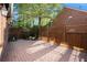 Brick patio with wooden privacy fence at 401 Wellwood Way, Roswell, GA 30075