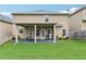 Spacious backyard features a covered patio, perfect for outdoor entertaining and relaxation at 931 Sublime Trl, Canton, GA 30114