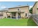 The property boasts a beautiful backyard and a charming covered patio with ample space at 931 Sublime Trl, Canton, GA 30114