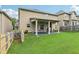 Well-maintained backyard with a covered patio, offering a great space for gatherings at 931 Sublime Trl, Canton, GA 30114