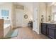 Spacious bathroom featuring double sinks, bathtub, and vanity area at 931 Sublime Trl, Canton, GA 30114