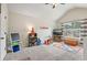 Spacious carpeted bedroom with vaulted ceilings and playful décor at 931 Sublime Trl, Canton, GA 30114