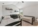 Shared bedroom with vaulted ceilings, neutral carpeting, two beds, and decorative shelving at 931 Sublime Trl, Canton, GA 30114