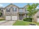 Charming brick home with a manicured lawn, two-car garage, and inviting front entrance at 931 Sublime Trl, Canton, GA 30114