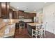 Well-equipped kitchen featuring granite countertops, stainless steel appliances, and a center island with seating at 931 Sublime Trl, Canton, GA 30114