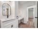 A modern bathroom with black matte hardware and bright vanity lighting at 1917 Connally Dr, Atlanta, GA 30344
