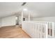 Bonus room showcasing wood floors, natural lighting, and access to the restroom at 1917 Connally Dr, Atlanta, GA 30344