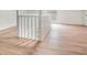 Bonus room showcasing wood floors, natural lighting, and a staircase at 1917 Connally Dr, Atlanta, GA 30344