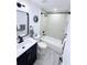 Bathroom with a shower/tub combo, a dark vanity and new fixtures at 195 Burbank Nw Dr, Atlanta, GA 30314