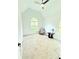 Neutral bedroom with a chair, ceiling fan, side table and lots of light at 195 Burbank Nw Dr, Atlanta, GA 30314