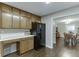 Functional kitchen offers ample storage with wood cabinets and a built-in desk area at 2903 Brookshire Way, Duluth, GA 30096
