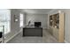 Spacious home office featuring ample workspace, natural light, and built-in shelving at 2903 Brookshire Way, Duluth, GA 30096