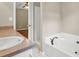 Bathroom featuring a bathtub, shower, and peach-colored vanity at 326 Acaro Ct, Ellenwood, GA 30294
