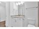 Bright bathroom vanity with granite countertop and modern fixtures at 1114 Low Water Crossing Nw, Acworth, GA 30101
