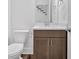 Bathroom featuring stylish vanity with sink and faucet and a wall mirror at 1114 Low Water Crossing Nw, Acworth, GA 30101