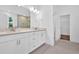 Bathroom featuring dual sinks, granite countertops, and walk-in shower at 1114 Low Water Crossing Nw, Acworth, GA 30101