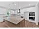 Well-equipped kitchen featuring a large island, stainless steel appliances, and abundant cabinet space at 1114 Low Water Crossing Nw, Acworth, GA 30101