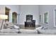 Living room with soaring ceilings and a large window offers natural light at 116 Chorley Run, Ellenwood, GA 30294