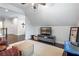 Bright bonus room provides additional living space for relaxing or entertaining with neutral decor and cozy seating at 1442 Pierce Se Ave, Smyrna, GA 30080