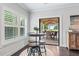Bright breakfast nook with modern furniture and outdoor view at 1442 Pierce Se Ave, Smyrna, GA 30080