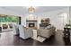 Cozy living room with fireplace and access to an outdoor patio at 1442 Pierce Se Ave, Smyrna, GA 30080