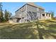 Expansive backyard with well-manicured lawn and house exterior, ideal for recreation and outdoor enjoyment at 3198 Garden Hill Ln, Douglasville, GA 30135
