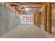 Unfinished basement with insulated walls and exposed wood framing at 3198 Garden Hill Ln, Douglasville, GA 30135