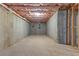 Spacious unfinished basement with concrete walls and ceiling insulation, a blank canvas for your design at 3198 Garden Hill Ln, Douglasville, GA 30135