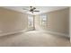 Spacious bedroom with neutral walls and ceiling fan at 3198 Garden Hill Ln, Douglasville, GA 30135