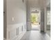 Light-filled foyer with wood floors and detailed trim creates a welcoming entrance at 3198 Garden Hill Ln, Douglasville, GA 30135