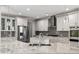 Modern kitchen with stainless appliances, gray subway tile, and granite countertops at 3198 Garden Hill Ln, Douglasville, GA 30135
