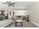 Spacious living room with neutral colors, ceiling fan, and open floor plan at 3198 Garden Hill Ln, Douglasville, GA 30135