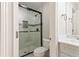 Modern tiled shower with black frame, glass door, and built-in niche at 3198 Garden Hill Ln, Douglasville, GA 30135