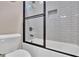 Modern bathroom features a glass shower door and white subway tile at 35 Cornish Creek Ln, Covington, GA 30014