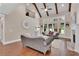 Inviting living room with high ceilings, fireplace, hardwood floors, and comfortable seating at 35 Cornish Creek Ln, Covington, GA 30014