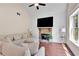 Spacious living room with fireplace and hardwood floors at 35 Cornish Creek Ln, Covington, GA 30014