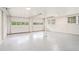Spacious basement with garage doors and painted concrete floors at 2702 Galaxy Ct, Decatur, GA 30034