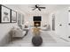 Cozy living room with a fireplace, white walls, and contemporary furniture for a relaxing ambiance at 2702 Galaxy Ct, Decatur, GA 30034