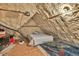 Finished attic with unique insulation, platform bed and stylish furniture at 3365 Sweetwater Dr, Cumming, GA 30041