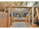 Unique attic space with foam insulation and a simple clothing rack system for organized storage at 3365 Sweetwater Dr, Cumming, GA 30041